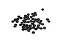 A collection of numerous small black rubber body mount washers and pads for RC vehicles scattered on a white background.