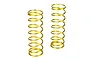 Two gold-coloured metal RC shock springs standing upright against a white background.