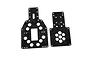 Two forged carbon fiber chassis plates with hexagonal cutouts and mounting holes on a white background.