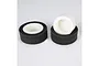 Two cylindrical foam air filters for RC cars, featuring a white inner core and a dark grey outer layer, set against a plain white background.