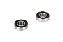 Two Losi rubber shielded ball bearings shown from an angled perspective against a white background.