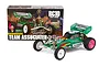 Team Associated RC10 1989 Masami Edition RC buggy kit box and fully assembled green and white off-road RC car.