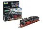 Revell 1/87 scale plastic model kit of an Express Loco S3/6 BR 18(5) train with tender, including paints, glue, and brush, shown with the assembled model.
