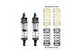 Two GPM Racing aluminium shock absorbers with extra gold and black springs on a white background.