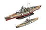 Two assembled plastic model kits of the German battleship Bismarck, one larger and one smaller, displayed on a white background.