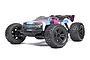 ARRMA Kraton 6S V6 BLX 1/8 scale RC truggy in a pink, blue, and white patterned livery, shown from a front three-quarter angle against a white background.