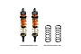 Two GPM Racing orange aluminium adjustable RC shock absorbers with gold springs, plus two additional black springs, on a white background.