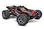 A studio shot of a Traxxas Rustler 4x4 BL-2s RC stadium truck in black and red livery, featuring large off-road tires and a rear spoiler.