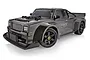 A grey Maverick Quantum R Flux 1/8 scale RC race truck viewed from a front three-quarter angle against a white background.