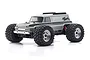A silver Kyosho Mad Wagon 1/10 scale 4WD RC monster truck studio shot against a white background.