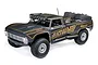 Losi Ford F-100 Baja Rey 2.0 4WD RC short course truck in matte black with gold Heatwave livery, featuring off-road tires and a roll cage.