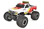 Team Associated MT12 Lux 1/12 scale 4WD electric RC monster truck with white, red, and yellow body graphics and large off-road tires.