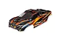Traxxas 1/16 Mini XRT painted body shell in orange, black, and blue racing livery, shown from a high-angle studio view.