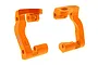 A pair of bright orange anodized aluminium steering hub carriers for Traxxas RC vehicles, marked with L and R for left and right sides.