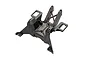 A black plastic Traxxas rear shock tower component for an RC vehicle, shown from a high-angle perspective against a white background.