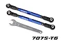 Two blue Traxxas aluminium toe links with black rod ends and a metal adjustment wrench on a white background.