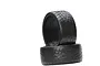 Two black 1/10 scale RC display tyres with detailed tread patterns stacked on a white background.