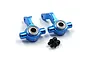 Two blue anodized aluminium RC steering hubs with pre-installed bearings and two black ball studs on a white background.