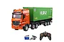 HuiNa 1317 RC semi truck in orange with a green shipping container, including a remote control, battery, and USB charging cable.
