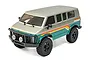 A 1/18 scale Hobby Plus CR-18P Evo Rock Van RC crawler in a metallic gunmetal and teal finish with retro-style side decals and off-road tires.