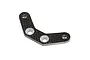 A V-shaped carbon fibre suspension pin brace for an RC car, featuring four mounting holes with countersunk edges.