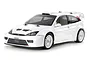 A studio shot of a white Tamiya 2003 Ford Focus RS RC car kit on a white background.