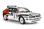 A 1/10 scale RC Lancia Delta HF Integrale rally car with Repsol livery, featuring white bodywork, racing decals, and white multi-spoke wheels.