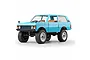A blue MN Model 1/12 scale RC Range Rover rock crawler shown from a front three-quarter angle against a white background.