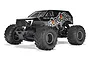 ARRMA GORGON 1/10 scale 2WD RC monster truck in gunmetal grey with aggressive off-road tires and custom graphics on a white background.