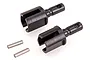 Two black metal differential drive cups and two small steel pins for an RC car, isolated on a white background.