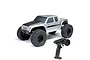 Axial SCX10 III Coyote RC rock crawler in silver with black hood and off-road tires, shown with a Spektrum SLT2 radio transmitter.
