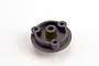 A black plastic Traxxas spur gear adapter with three mounting holes and a central cylindrical hub, isolated on a white background.