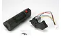 Traxxas EZ-Start 2 system including the black handheld starter unit, the engine-mounted starter motor assembly, and a small bag of mounting screws.