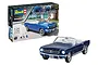 A Revell 1/24 scale 1964 Ford Mustang plastic model kit box and a fully assembled blue convertible model car.