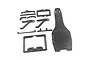 A set of carbon fibre RC car chassis conversion parts including a main deck and various braces laid out on a white background.