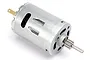 A silver Traxxas EZ-Start 2 electric motor with a small metal pinion gear attached to the shaft.