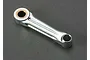 A silver metal connecting rod for a Traxxas TRX 2.5 engine, featuring a bronze bushing at one end.