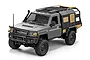 A grey MN Model Toyota LC79 RC rock crawler truck in 1/12 scale, featuring a black canopy, roof rack, and off-road tires on a white background.