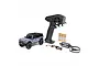 Axial SCX30 Ford Bronco 1/30 scale RC rock crawler in grey, including a Spektrum SLT2 transmitter, USB LiPo charger, battery, and four AA batteries.