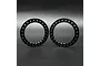 Two black circular aluminium beadlock rings for 1.9 inch RC wheels, displayed side-by-side against a dark grey background.