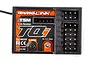 Traxxas TQi 2.4GHz 5-channel receiver with TSM technology, showing connection ports and branding on a black plastic casing.