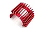 A red anodized aluminium motor heat sink with cooling fins, designed for RC car motors.