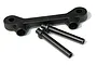A black plastic steering mount brace and two matching black plastic mounting posts for an RC car.