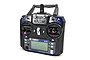 Flysky FS-i6 6-channel RC radio transmitter in black with purple stick ends, featuring an LCD screen and various switches.