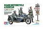 Tamiya 1/35 scale German KS600 motorcycle and sidecar plastic model kit box art showing soldiers and a signpost.