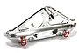 Silver aluminium Integy V2 rear bumper with integrated spare wheel rack for RC crawler on white background.