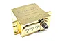 A gold-coloured Reefs RC TRIPLE7 14V brushless metal gear servo with a polished brass finish, shown from a high-angle studio perspective.
