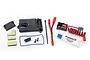 Traxxas 2262 BEC assembly kit including receiver box, wiring, silicone grease, and mounting hardware on a white background.