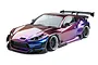 A studio shot of the MST RMX 2.5 GR86RB RC drift car in an iridescence purple finish, featuring a wide-body kit and rear wing on a white background.