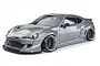 A metallic grey MST RMX 2.5 86RB RC drift car on a white background, featuring a wide-body kit and black wheels.